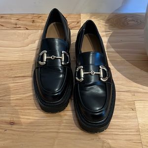 Chunky Black with Gold hardware Loafers from H&M.